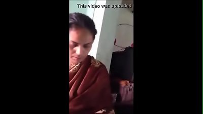 Amma displaying jugs to son-in-law