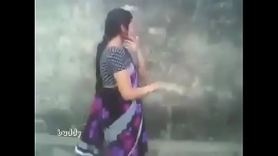 indian hot aunty in saree outdoor blow and hooter press