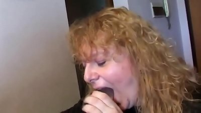 excited older chick plays with cock and playthings in her crevasse