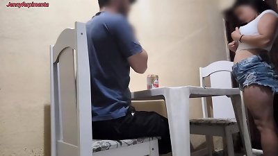 young couple having romp in a bar in public