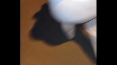 mature girl wearing crimson thread in transparent leggings, gripped on the street